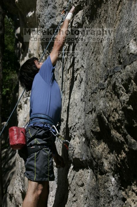 Javier Morales on the dyno while leading Lick the Window (5.10c).  It was another long day of rock climbing at Seismic Wall on Austin's Barton Creek Greenbelt, Sunday, April 5, 2009.

Filename: SRM_20090405_11440668.jpg
Aperture: f/7.1
Shutter Speed: 1/500
Body: Canon EOS-1D Mark II
Lens: Canon EF 80-200mm f/2.8 L