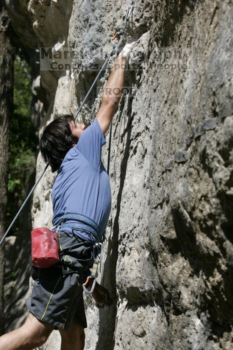 Javier Morales on the dyno while leading Lick the Window (5.10c).  It was another long day of rock climbing at Seismic Wall on Austin's Barton Creek Greenbelt, Sunday, April 5, 2009.

Filename: SRM_20090405_11452774.jpg
Aperture: f/5.0
Shutter Speed: 1/500
Body: Canon EOS-1D Mark II
Lens: Canon EF 80-200mm f/2.8 L