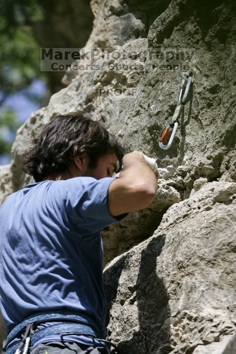 Javier Morales on the dyno while leading Lick the Window (5.10c).  It was another long day of rock climbing at Seismic Wall on Austin's Barton Creek Greenbelt, Sunday, April 5, 2009.

Filename: SRM_20090405_11463377.jpg
Aperture: f/4.0
Shutter Speed: 1/500
Body: Canon EOS-1D Mark II
Lens: Canon EF 80-200mm f/2.8 L