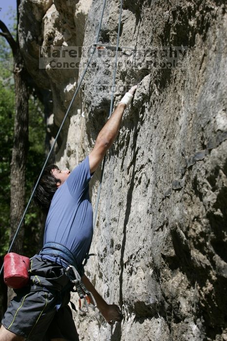 Javier Morales on the dyno while leading Lick the Window (5.10c).  It was another long day of rock climbing at Seismic Wall on Austin's Barton Creek Greenbelt, Sunday, April 5, 2009.

Filename: SRM_20090405_11483881.jpg
Aperture: f/5.6
Shutter Speed: 1/500
Body: Canon EOS-1D Mark II
Lens: Canon EF 80-200mm f/2.8 L