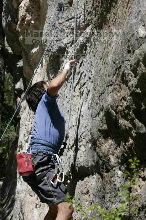 Javier Morales on the dyno while leading Lick the Window (5.10c).  It was another long day of rock climbing at Seismic Wall on Austin's Barton Creek Greenbelt, Sunday, April 5, 2009.

Filename: SRM_20090405_11492682.jpg
Aperture: f/7.1
Shutter Speed: 1/500
Body: Canon EOS-1D Mark II
Lens: Canon EF 80-200mm f/2.8 L