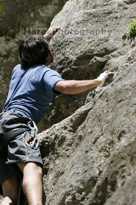 Javier Morales on the dyno while leading Lick the Window (5.10c).  It was another long day of rock climbing at Seismic Wall on Austin's Barton Creek Greenbelt, Sunday, April 5, 2009.

Filename: SRM_20090405_11505387.jpg
Aperture: f/5.6
Shutter Speed: 1/500
Body: Canon EOS-1D Mark II
Lens: Canon EF 80-200mm f/2.8 L