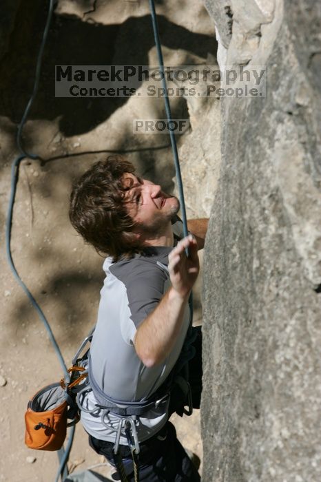 Andrew Dreher attempting the dyno while leading Lick the Window (5.10c), shot from the top of Ack! (5.11b, but using the crack for the start instead) that I top roped up with my camera on my back.  It was another long day of rock climbing at Seismic Wall on Austin's Barton Creek Greenbelt, Sunday, April 5, 2009.

Filename: SRM_20090405_13155909.jpg
Aperture: f/10.0
Shutter Speed: 1/500
Body: Canon EOS-1D Mark II
Lens: Canon EF 80-200mm f/2.8 L