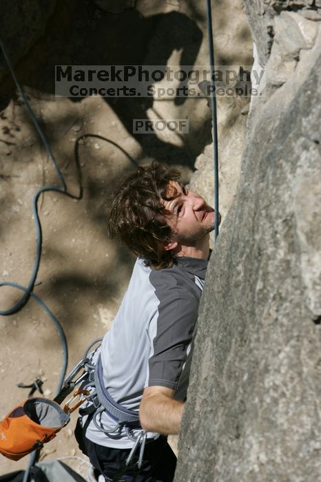 Andrew Dreher attempting the dyno while leading Lick the Window (5.10c), shot from the top of Ack! (5.11b, but using the crack for the start instead) that I top roped up with my camera on my back.  It was another long day of rock climbing at Seismic Wall on Austin's Barton Creek Greenbelt, Sunday, April 5, 2009.

Filename: SRM_20090405_13170721.jpg
Aperture: f/10.0
Shutter Speed: 1/500
Body: Canon EOS-1D Mark II
Lens: Canon EF 80-200mm f/2.8 L