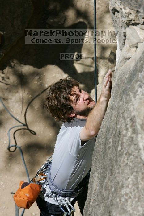 Andrew Dreher attempting the dyno while leading Lick the Window (5.10c), shot from the top of Ack! (5.11b, but using the crack for the start instead) that I top roped up with my camera on my back.  It was another long day of rock climbing at Seismic Wall on Austin's Barton Creek Greenbelt, Sunday, April 5, 2009.

Filename: SRM_20090405_13170822.jpg
Aperture: f/9.0
Shutter Speed: 1/500
Body: Canon EOS-1D Mark II
Lens: Canon EF 80-200mm f/2.8 L