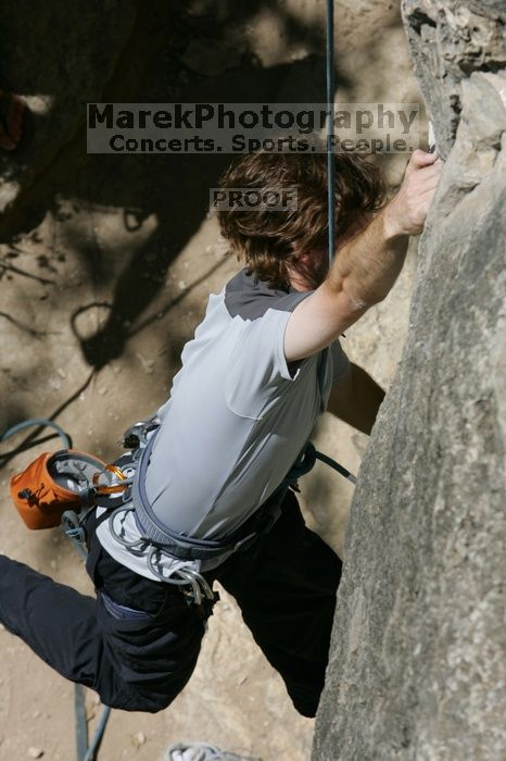 Andrew Dreher attempting the dyno while leading Lick the Window (5.10c), shot from the top of Ack! (5.11b, but using the crack for the start instead) that I top roped up with my camera on my back.  It was another long day of rock climbing at Seismic Wall on Austin's Barton Creek Greenbelt, Sunday, April 5, 2009.

Filename: SRM_20090405_13170826.jpg
Aperture: f/10.0
Shutter Speed: 1/500
Body: Canon EOS-1D Mark II
Lens: Canon EF 80-200mm f/2.8 L