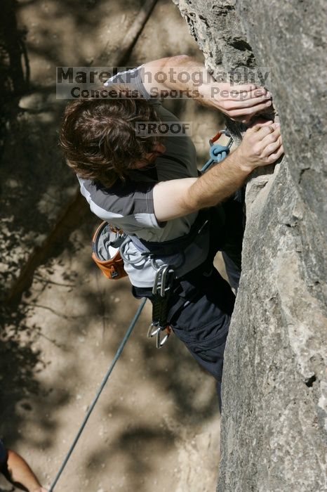 Andrew Dreher leading Lick the Window (5.10c), shot from the top of Ack! (5.11b, but using the crack for the start instead) that I top roped up with my camera on my back.  It was another long day of rock climbing at Seismic Wall on Austin's Barton Creek Greenbelt, Sunday, April 5, 2009.

Filename: SRM_20090405_13214655.jpg
Aperture: f/10.0
Shutter Speed: 1/500
Body: Canon EOS-1D Mark II
Lens: Canon EF 80-200mm f/2.8 L