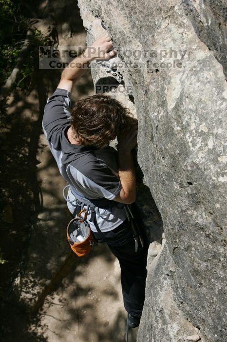 Andrew Dreher leading Lick the Window (5.10c), shot from the top of Ack! (5.11b, but using the crack for the start instead) that I top roped up with my camera on my back.  It was another long day of rock climbing at Seismic Wall on Austin's Barton Creek Greenbelt, Sunday, April 5, 2009.

Filename: SRM_20090405_13215462.jpg
Aperture: f/10.0
Shutter Speed: 1/500
Body: Canon EOS-1D Mark II
Lens: Canon EF 80-200mm f/2.8 L