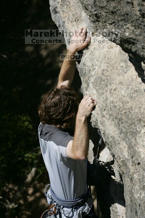 Andrew Dreher leading Lick the Window (5.10c), shot from the top of Ack! (5.11b, but using the crack for the start instead) that I top roped up with my camera on my back.  It was another long day of rock climbing at Seismic Wall on Austin's Barton Creek Greenbelt, Sunday, April 5, 2009.

Filename: SRM_20090405_13225287.jpg
Aperture: f/7.1
Shutter Speed: 1/500
Body: Canon EOS-1D Mark II
Lens: Canon EF 80-200mm f/2.8 L