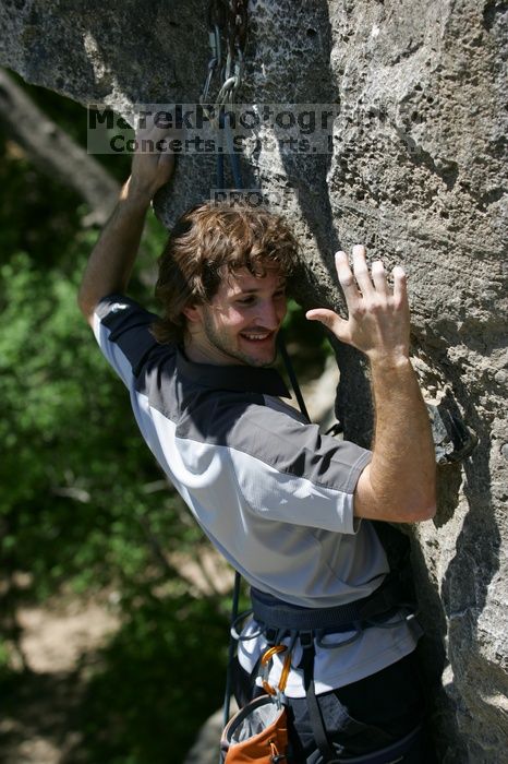 Andrew Dreher leading Lick the Window (5.10c), shot from the top of Ack! (5.11b, but using the crack for the start instead) that I top roped up with my camera on my back.  It was another long day of rock climbing at Seismic Wall on Austin's Barton Creek Greenbelt, Sunday, April 5, 2009.

Filename: SRM_20090405_13242749.jpg
Aperture: f/4.5
Shutter Speed: 1/500
Body: Canon EOS-1D Mark II
Lens: Canon EF 80-200mm f/2.8 L