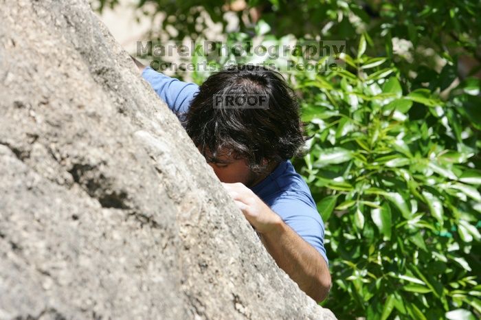 Javier Morales leading Nose Print on the Windshield (5.11c), shot from the top of Ack! (5.11b, but using the crack for the start instead) that I top roped up with my camera on my back.  It was another long day of rock climbing at Seismic Wall on Austin's Barton Creek Greenbelt, Sunday, April 5, 2009.

Filename: SRM_20090405_13320755.jpg
Aperture: f/8.0
Shutter Speed: 1/500
Body: Canon EOS-1D Mark II
Lens: Canon EF 80-200mm f/2.8 L