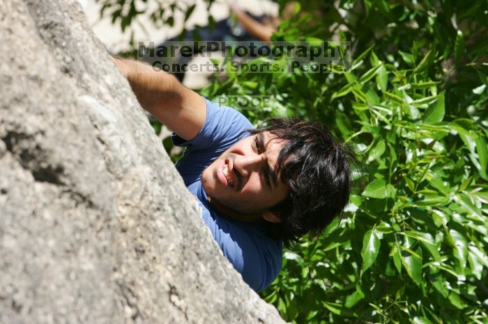 Javier Morales leading Nose Print on the Windshield (5.11c), shot from the top of Ack! (5.11b, but using the crack for the start instead) that I top roped up with my camera on my back.  It was another long day of rock climbing at Seismic Wall on Austin's Barton Creek Greenbelt, Sunday, April 5, 2009.

Filename: SRM_20090405_13334373.jpg
Aperture: f/9.0
Shutter Speed: 1/500
Body: Canon EOS-1D Mark II
Lens: Canon EF 80-200mm f/2.8 L