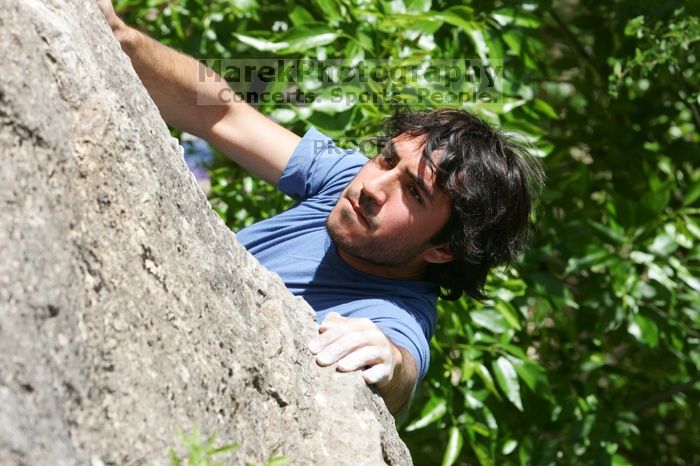 Javier Morales leading Nose Print on the Windshield (5.11c), shot from the top of Ack! (5.11b, but using the crack for the start instead) that I top roped up with my camera on my back.  It was another long day of rock climbing at Seismic Wall on Austin's Barton Creek Greenbelt, Sunday, April 5, 2009.

Filename: SRM_20090405_13334876.jpg
Aperture: f/8.0
Shutter Speed: 1/500
Body: Canon EOS-1D Mark II
Lens: Canon EF 80-200mm f/2.8 L