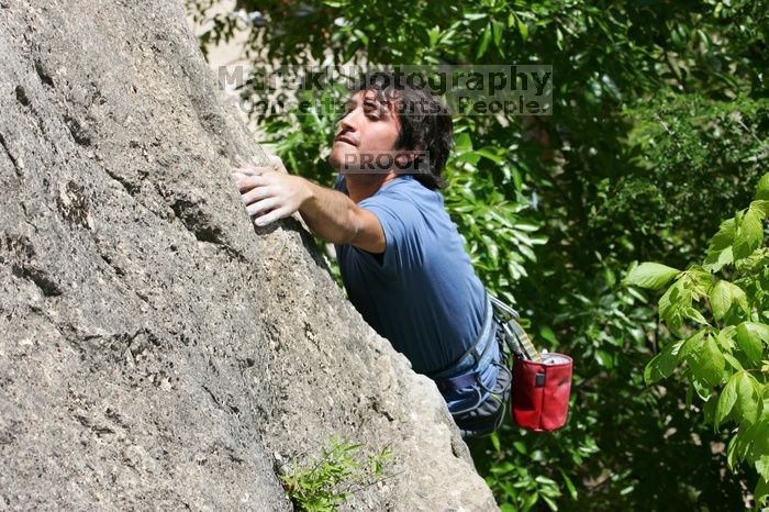 Javier Morales leading Nose Print on the Windshield (5.11c), shot from the top of Ack! (5.11b, but using the crack for the start instead) that I top roped up with my camera on my back.  It was another long day of rock climbing at Seismic Wall on Austin's Barton Creek Greenbelt, Sunday, April 5, 2009.

Filename: SRM_20090405_13335780.jpg
Aperture: f/9.0
Shutter Speed: 1/500
Body: Canon EOS-1D Mark II
Lens: Canon EF 80-200mm f/2.8 L