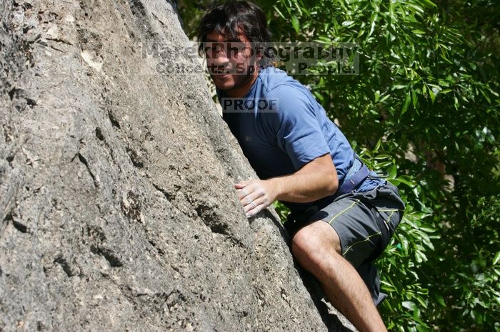 Javier Morales leading Nose Print on the Windshield (5.11c), shot from the top of Ack! (5.11b, but using the crack for the start instead) that I top roped up with my camera on my back.  It was another long day of rock climbing at Seismic Wall on Austin's Barton Creek Greenbelt, Sunday, April 5, 2009.

Filename: SRM_20090405_13340487.jpg
Aperture: f/10.0
Shutter Speed: 1/500
Body: Canon EOS-1D Mark II
Lens: Canon EF 80-200mm f/2.8 L