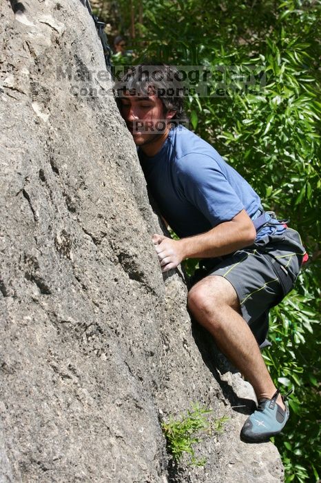 Javier Morales leading Nose Print on the Windshield (5.11c), shot from the top of Ack! (5.11b, but using the crack for the start instead) that I top roped up with my camera on my back.  It was another long day of rock climbing at Seismic Wall on Austin's Barton Creek Greenbelt, Sunday, April 5, 2009.

Filename: SRM_20090405_13342095.jpg
Aperture: f/10.0
Shutter Speed: 1/500
Body: Canon EOS-1D Mark II
Lens: Canon EF 80-200mm f/2.8 L