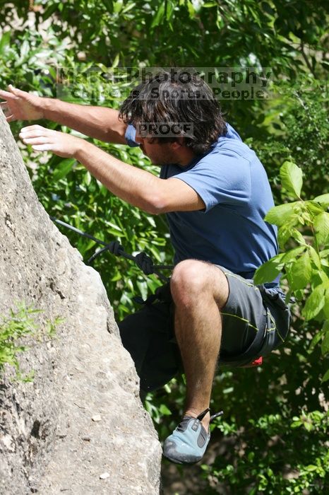 Javier Morales leading Nose Print on the Windshield (5.11c), shot from the top of Ack! (5.11b, but using the crack for the start instead) that I top roped up with my camera on my back.  It was another long day of rock climbing at Seismic Wall on Austin's Barton Creek Greenbelt, Sunday, April 5, 2009.

Filename: SRM_20090405_13342999.jpg
Aperture: f/8.0
Shutter Speed: 1/500
Body: Canon EOS-1D Mark II
Lens: Canon EF 80-200mm f/2.8 L