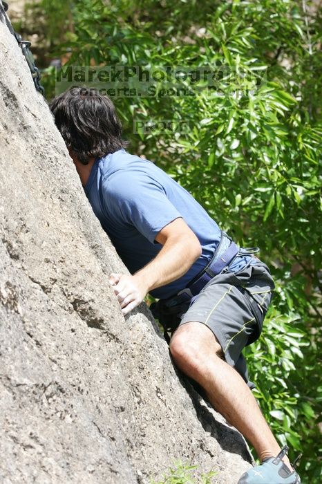 Javier Morales leading Nose Print on the Windshield (5.11c), shot from the top of Ack! (5.11b, but using the crack for the start instead) that I top roped up with my camera on my back.  It was another long day of rock climbing at Seismic Wall on Austin's Barton Creek Greenbelt, Sunday, April 5, 2009.

Filename: SRM_20090405_13371309.jpg
Aperture: f/7.1
Shutter Speed: 1/500
Body: Canon EOS-1D Mark II
Lens: Canon EF 80-200mm f/2.8 L