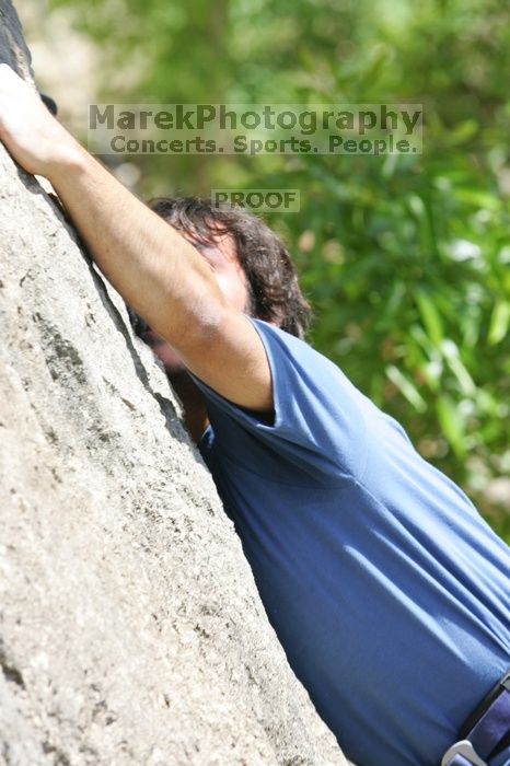 Javier Morales leading Nose Print on the Windshield (5.11c), shot from the top of Ack! (5.11b, but using the crack for the start instead) that I top roped up with my camera on my back.  It was another long day of rock climbing at Seismic Wall on Austin's Barton Creek Greenbelt, Sunday, April 5, 2009.

Filename: SRM_20090405_13371716.jpg
Aperture: f/6.3
Shutter Speed: 1/500
Body: Canon EOS-1D Mark II
Lens: Canon EF 80-200mm f/2.8 L