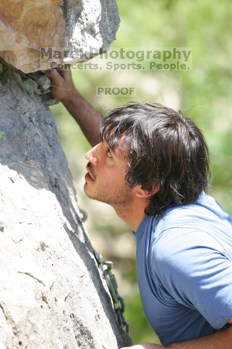 Javier Morales leading Nose Print on the Windshield (5.11c), shot from the top of Ack! (5.11b, but using the crack for the start instead) that I top roped up with my camera on my back.  It was another long day of rock climbing at Seismic Wall on Austin's Barton Creek Greenbelt, Sunday, April 5, 2009.

Filename: SRM_20090405_13372917.jpg
Aperture: f/5.0
Shutter Speed: 1/500
Body: Canon EOS-1D Mark II
Lens: Canon EF 80-200mm f/2.8 L