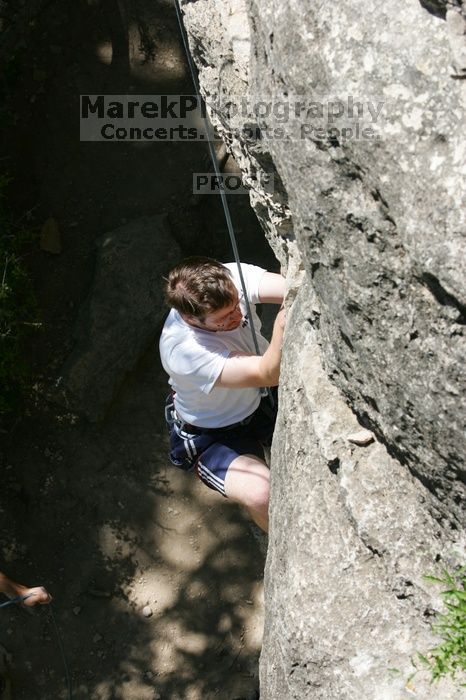 Me top roping Lick the Window (5.10c), shot (by Andrew Dreher) from the top of Ack! (5.11b, but using the crack for the start instead) that I top roped up with my camera on my back.  It was another long day of rock climbing at Seismic Wall on Austin's Barton Creek Greenbelt, Sunday, April 5, 2009.

Filename: SRM_20090405_14391942.jpg
Aperture: f/9.0
Shutter Speed: 1/500
Body: Canon EOS-1D Mark II
Lens: Canon EF 80-200mm f/2.8 L