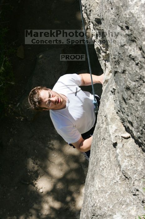 Me top roping Lick the Window (5.10c), shot (by Andrew Dreher) from the top of Ack! (5.11b, but using the crack for the start instead) that I top roped up with my camera on my back.  It was another long day of rock climbing at Seismic Wall on Austin's Barton Creek Greenbelt, Sunday, April 5, 2009.

Filename: SRM_20090405_14393344.jpg
Aperture: f/9.0
Shutter Speed: 1/500
Body: Canon EOS-1D Mark II
Lens: Canon EF 80-200mm f/2.8 L