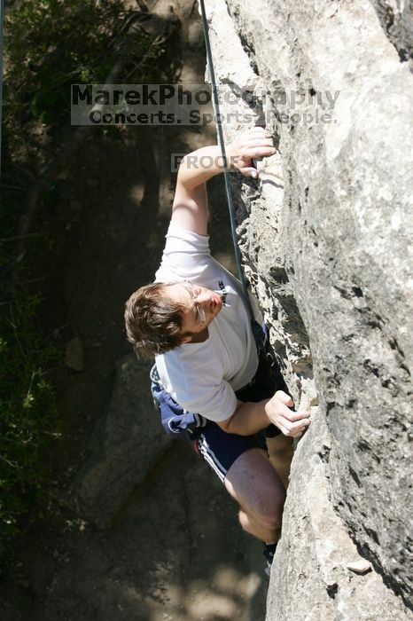 Me top roping Lick the Window (5.10c), shot (by Andrew Dreher) from the top of Ack! (5.11b, but using the crack for the start instead) that I top roped up with my camera on my back.  It was another long day of rock climbing at Seismic Wall on Austin's Barton Creek Greenbelt, Sunday, April 5, 2009.

Filename: SRM_20090405_14400050.jpg
Aperture: f/8.0
Shutter Speed: 1/500
Body: Canon EOS-1D Mark II
Lens: Canon EF 80-200mm f/2.8 L