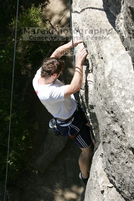 Me top roping Lick the Window (5.10c), shot (by Andrew Dreher) from the top of Ack! (5.11b, but using the crack for the start instead) that I top roped up with my camera on my back.  It was another long day of rock climbing at Seismic Wall on Austin's Barton Creek Greenbelt, Sunday, April 5, 2009.

Filename: SRM_20090405_14400551.jpg
Aperture: f/9.0
Shutter Speed: 1/500
Body: Canon EOS-1D Mark II
Lens: Canon EF 80-200mm f/2.8 L