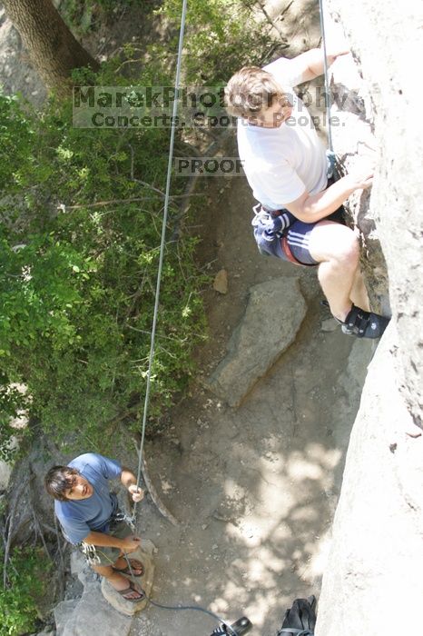 Me top roping Lick the Window (5.10c), shot (by Andrew Dreher) from the top of Ack! (5.11b, but using the crack for the start instead) that I top roped up with my camera on my back.  It was another long day of rock climbing at Seismic Wall on Austin's Barton Creek Greenbelt, Sunday, April 5, 2009.

Filename: SRM_20090405_14402653.jpg
Aperture: f/4.0
Shutter Speed: 1/500
Body: Canon EOS-1D Mark II
Lens: Canon EF 80-200mm f/2.8 L