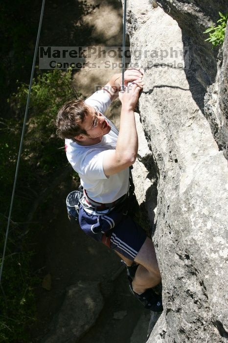 Me top roping Lick the Window (5.10c), shot (by Andrew Dreher) from the top of Ack! (5.11b, but using the crack for the start instead) that I top roped up with my camera on my back.  It was another long day of rock climbing at Seismic Wall on Austin's Barton Creek Greenbelt, Sunday, April 5, 2009.

Filename: SRM_20090405_14403854.jpg
Aperture: f/8.0
Shutter Speed: 1/500
Body: Canon EOS-1D Mark II
Lens: Canon EF 80-200mm f/2.8 L