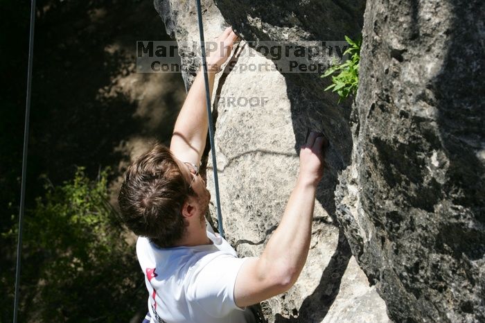 Me top roping Lick the Window (5.10c), shot (by Andrew Dreher) from the top of Ack! (5.11b, but using the crack for the start instead) that I top roped up with my camera on my back.  It was another long day of rock climbing at Seismic Wall on Austin's Barton Creek Greenbelt, Sunday, April 5, 2009.

Filename: SRM_20090405_14404755.jpg
Aperture: f/10.0
Shutter Speed: 1/500
Body: Canon EOS-1D Mark II
Lens: Canon EF 80-200mm f/2.8 L