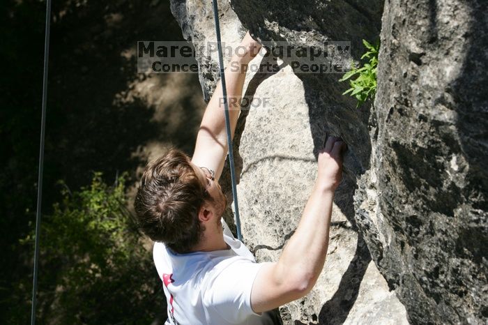 Me top roping Lick the Window (5.10c), shot (by Andrew Dreher) from the top of Ack! (5.11b, but using the crack for the start instead) that I top roped up with my camera on my back.  It was another long day of rock climbing at Seismic Wall on Austin's Barton Creek Greenbelt, Sunday, April 5, 2009.

Filename: SRM_20090405_14404756.jpg
Aperture: f/10.0
Shutter Speed: 1/500
Body: Canon EOS-1D Mark II
Lens: Canon EF 80-200mm f/2.8 L