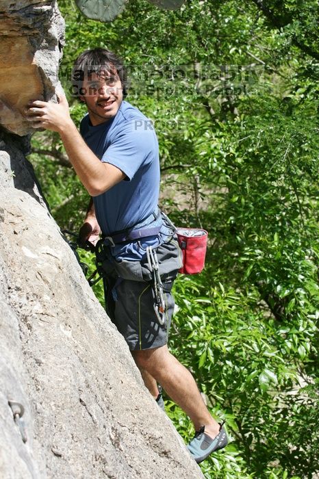 Javier Morales leading Nose Print on the Windshield (5.11c), shot from the top of Ack! (5.11b, but using the crack for the start instead) that I top roped up with my camera on my back.  It was another long day of rock climbing at Seismic Wall on Austin's Barton Creek Greenbelt, Sunday, April 5, 2009.

Filename: SRM_20090405_14563187.jpg
Aperture: f/8.0
Shutter Speed: 1/500
Body: Canon EOS-1D Mark II
Lens: Canon EF 80-200mm f/2.8 L