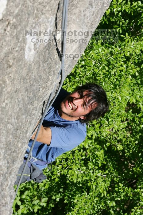 Javier Morales top rope climbing She's No Dog, She's My Wife (5.11b), shot from the top of Ack! (5.11b, but using the crack for the start instead) that I top roped up with my camera on my back.  It was another long day of rock climbing at Seismic Wall on Austin's Barton Creek Greenbelt, Sunday, April 5, 2009.

Filename: SRM_20090405_16171591.jpg
Aperture: f/10.0
Shutter Speed: 1/500
Body: Canon EOS-1D Mark II
Lens: Canon EF 80-200mm f/2.8 L