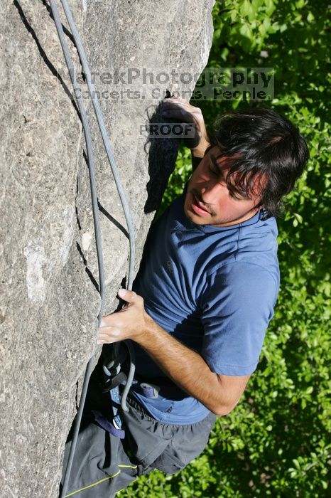 Javier Morales top rope climbing She's No Dog, She's My Wife (5.11b), shot from the top of Ack! (5.11b, but using the crack for the start instead) that I top roped up with my camera on my back.  It was another long day of rock climbing at Seismic Wall on Austin's Barton Creek Greenbelt, Sunday, April 5, 2009.

Filename: SRM_20090405_16173513.jpg
Aperture: f/10.0
Shutter Speed: 1/500
Body: Canon EOS-1D Mark II
Lens: Canon EF 80-200mm f/2.8 L