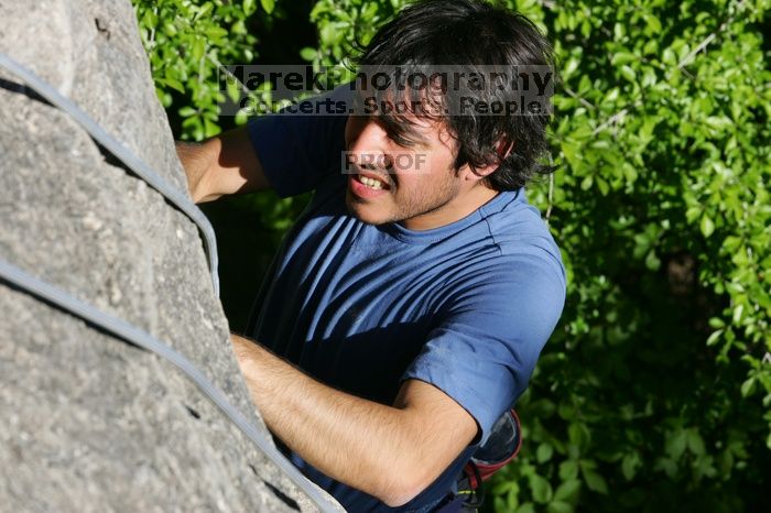 Javier Morales top rope climbing She's No Dog, She's My Wife (5.11b), shot from the top of Ack! (5.11b, but using the crack for the start instead) that I top roped up with my camera on my back.  It was another long day of rock climbing at Seismic Wall on Austin's Barton Creek Greenbelt, Sunday, April 5, 2009.

Filename: SRM_20090405_16480144.jpg
Aperture: f/10.0
Shutter Speed: 1/400
Body: Canon EOS-1D Mark II
Lens: Canon EF 80-200mm f/2.8 L