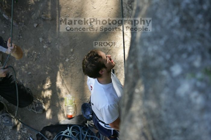 Me top roping Lick the Window (5.10c), shot by Javier Morales from the top of Ack! (5.11b, but using the crack for the start instead) that I top roped up with my camera on my back.  It was another long day of rock climbing at Seismic Wall on Austin's Barton Creek Greenbelt, Sunday, April 5, 2009.

Filename: SRM_20090405_17173691.jpg
Aperture: f/3.2
Shutter Speed: 1/400
Body: Canon EOS-1D Mark II
Lens: Canon EF 80-200mm f/2.8 L