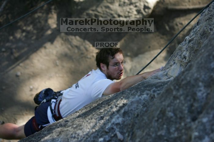 Me top roping Lick the Window (5.10c), shot by Javier Morales from the top of Ack! (5.11b, but using the crack for the start instead) that I top roped up with my camera on my back.  It was another long day of rock climbing at Seismic Wall on Austin's Barton Creek Greenbelt, Sunday, April 5, 2009.

Filename: SRM_20090405_17181502.jpg
Aperture: f/3.5
Shutter Speed: 1/400
Body: Canon EOS-1D Mark II
Lens: Canon EF 80-200mm f/2.8 L