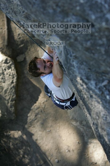 Me top roping Lick the Window (5.10c), shot by Javier Morales from the top of Ack! (5.11b, but using the crack for the start instead) that I top roped up with my camera on my back.  It was another long day of rock climbing at Seismic Wall on Austin's Barton Creek Greenbelt, Sunday, April 5, 2009.

Filename: SRM_20090405_17181610.jpg
Aperture: f/3.5
Shutter Speed: 1/400
Body: Canon EOS-1D Mark II
Lens: Canon EF 80-200mm f/2.8 L