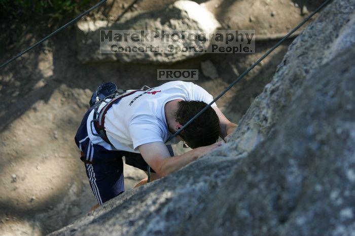 Me top roping Lick the Window (5.10c), shot by Javier Morales from the top of Ack! (5.11b, but using the crack for the start instead) that I top roped up with my camera on my back.  It was another long day of rock climbing at Seismic Wall on Austin's Barton Creek Greenbelt, Sunday, April 5, 2009.

Filename: SRM_20090405_17182017.jpg
Aperture: f/3.5
Shutter Speed: 1/400
Body: Canon EOS-1D Mark II
Lens: Canon EF 80-200mm f/2.8 L