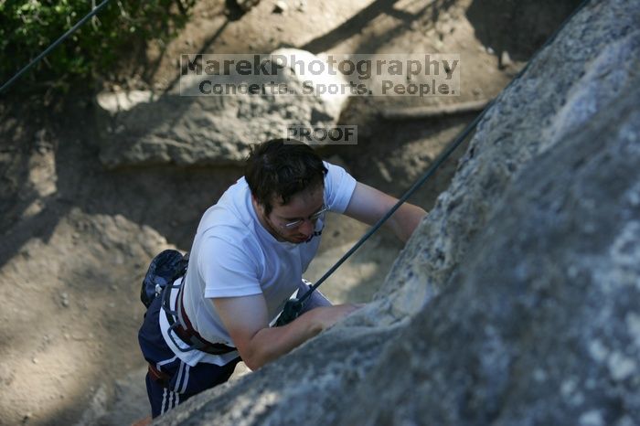 Me top roping Lick the Window (5.10c), shot by Javier Morales from the top of Ack! (5.11b, but using the crack for the start instead) that I top roped up with my camera on my back.  It was another long day of rock climbing at Seismic Wall on Austin's Barton Creek Greenbelt, Sunday, April 5, 2009.

Filename: SRM_20090405_17182222.jpg
Aperture: f/3.5
Shutter Speed: 1/400
Body: Canon EOS-1D Mark II
Lens: Canon EF 80-200mm f/2.8 L