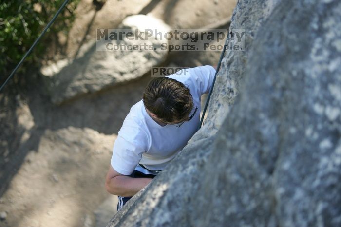 Me top roping Lick the Window (5.10c), shot by Javier Morales from the top of Ack! (5.11b, but using the crack for the start instead) that I top roped up with my camera on my back.  It was another long day of rock climbing at Seismic Wall on Austin's Barton Creek Greenbelt, Sunday, April 5, 2009.

Filename: SRM_20090405_17183228.jpg
Aperture: f/2.8
Shutter Speed: 1/400
Body: Canon EOS-1D Mark II
Lens: Canon EF 80-200mm f/2.8 L