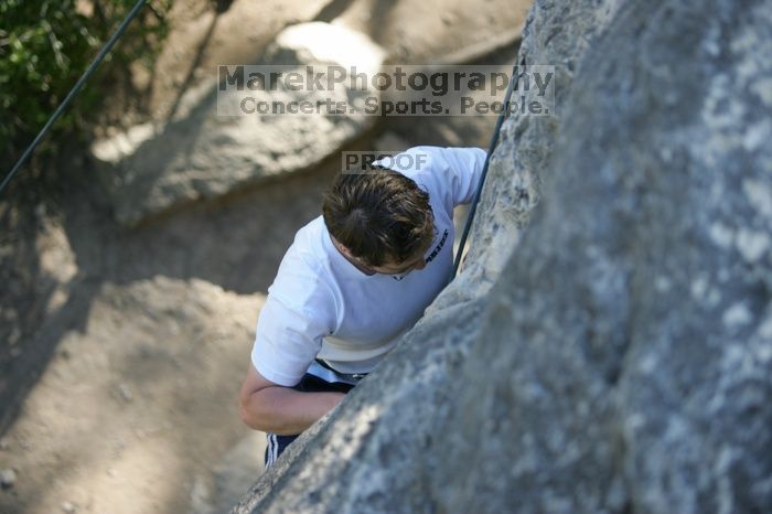 Me top roping Lick the Window (5.10c), shot by Javier Morales from the top of Ack! (5.11b, but using the crack for the start instead) that I top roped up with my camera on my back.  It was another long day of rock climbing at Seismic Wall on Austin's Barton Creek Greenbelt, Sunday, April 5, 2009.

Filename: SRM_20090405_17183229.jpg
Aperture: f/2.8
Shutter Speed: 1/400
Body: Canon EOS-1D Mark II
Lens: Canon EF 80-200mm f/2.8 L