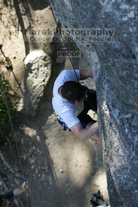 Me top roping Lick the Window (5.10c), shot by Javier Morales from the top of Ack! (5.11b, but using the crack for the start instead) that I top roped up with my camera on my back.  It was another long day of rock climbing at Seismic Wall on Austin's Barton Creek Greenbelt, Sunday, April 5, 2009.

Filename: SRM_20090405_17185643.jpg
Aperture: f/3.5
Shutter Speed: 1/400
Body: Canon EOS-1D Mark II
Lens: Canon EF 80-200mm f/2.8 L