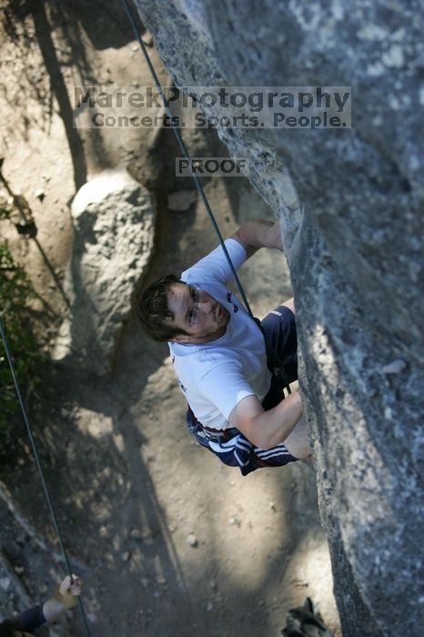 Me top roping Lick the Window (5.10c), shot by Javier Morales from the top of Ack! (5.11b, but using the crack for the start instead) that I top roped up with my camera on my back.  It was another long day of rock climbing at Seismic Wall on Austin's Barton Creek Greenbelt, Sunday, April 5, 2009.

Filename: SRM_20090405_17185744.jpg
Aperture: f/3.2
Shutter Speed: 1/400
Body: Canon EOS-1D Mark II
Lens: Canon EF 80-200mm f/2.8 L