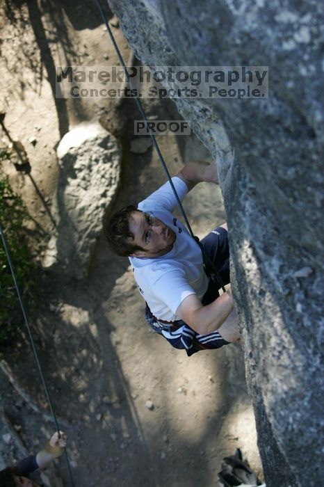 Me top roping Lick the Window (5.10c), shot by Javier Morales from the top of Ack! (5.11b, but using the crack for the start instead) that I top roped up with my camera on my back.  It was another long day of rock climbing at Seismic Wall on Austin's Barton Creek Greenbelt, Sunday, April 5, 2009.

Filename: SRM_20090405_17185745.jpg
Aperture: f/3.5
Shutter Speed: 1/400
Body: Canon EOS-1D Mark II
Lens: Canon EF 80-200mm f/2.8 L