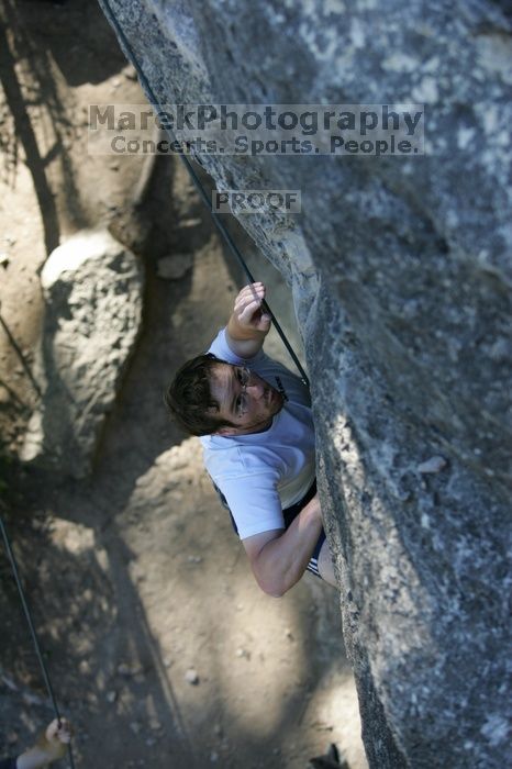 Me top roping Lick the Window (5.10c), shot by Javier Morales from the top of Ack! (5.11b, but using the crack for the start instead) that I top roped up with my camera on my back.  It was another long day of rock climbing at Seismic Wall on Austin's Barton Creek Greenbelt, Sunday, April 5, 2009.

Filename: SRM_20090405_17185850.jpg
Aperture: f/3.5
Shutter Speed: 1/400
Body: Canon EOS-1D Mark II
Lens: Canon EF 80-200mm f/2.8 L