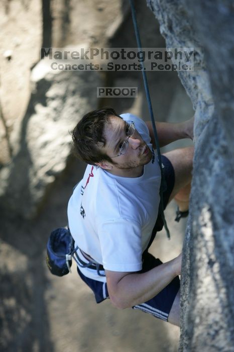 Me top roping Lick the Window (5.10c), shot by Javier Morales from the top of Ack! (5.11b, but using the crack for the start instead) that I top roped up with my camera on my back.  It was another long day of rock climbing at Seismic Wall on Austin's Barton Creek Greenbelt, Sunday, April 5, 2009.

Filename: SRM_20090405_17202169.jpg
Aperture: f/3.2
Shutter Speed: 1/400
Body: Canon EOS-1D Mark II
Lens: Canon EF 80-200mm f/2.8 L