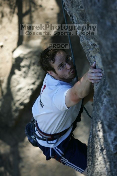 Me top roping Lick the Window (5.10c), shot by Javier Morales from the top of Ack! (5.11b, but using the crack for the start instead) that I top roped up with my camera on my back.  It was another long day of rock climbing at Seismic Wall on Austin's Barton Creek Greenbelt, Sunday, April 5, 2009.

Filename: SRM_20090405_17202275.jpg
Aperture: f/4.0
Shutter Speed: 1/400
Body: Canon EOS-1D Mark II
Lens: Canon EF 80-200mm f/2.8 L