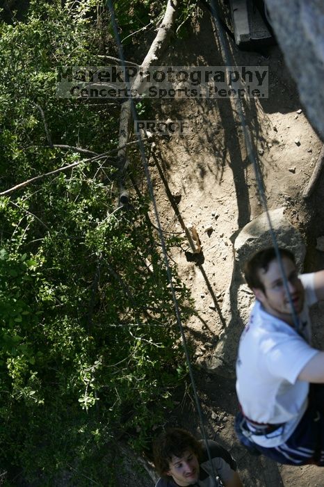 Me top roping Lick the Window (5.10c), shot by Javier Morales from the top of Ack! (5.11b, but using the crack for the start instead) that I top roped up with my camera on my back.  It was another long day of rock climbing at Seismic Wall on Austin's Barton Creek Greenbelt, Sunday, April 5, 2009.

Filename: SRM_20090405_17210599.jpg
Aperture: f/3.5
Shutter Speed: 1/400
Body: Canon EOS-1D Mark II
Lens: Canon EF 80-200mm f/2.8 L